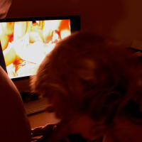 GF sucks my cock while she watches porn