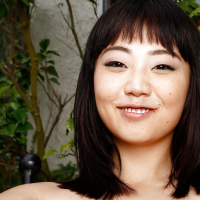 Petite Oriental model Miko Dai pulling labia lips wide open outdoors