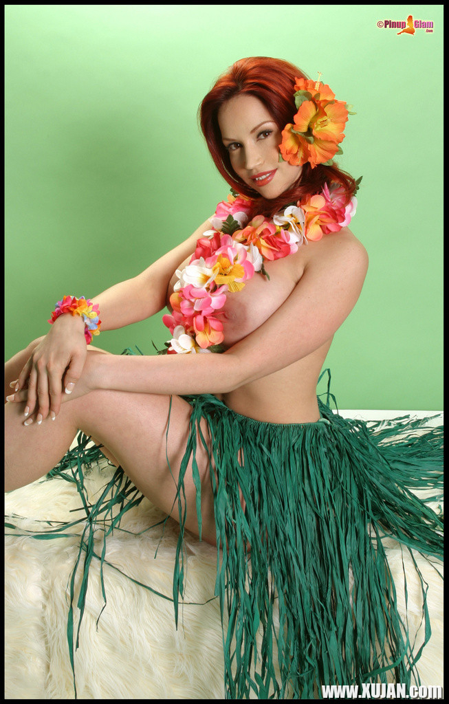 Busty Redhead Bianca Beauchamp Stripteases in a Hula Skirt and Flashes Her Big B - Photo #2960261