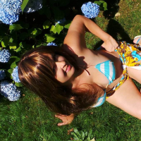 Britney Swallows posing for bikini pics in the garden