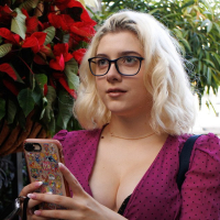 Gia OhMy pops out her breasts and big ass