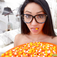 Eating popcorn ends up with some mouth fucking action for a teen in glasses