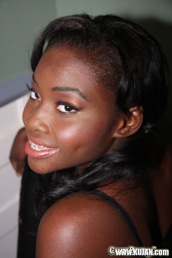 Ebony babe Osa Lovely gets a nasty facial cum bukkake - Photo #3042442