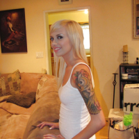 Blonde teen babe Emma Mae shows her melons and her juicy twat
