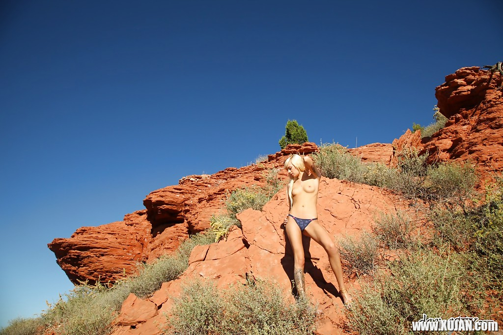 Graceful blonde Emma Mae stripping off her top and panties outdoor - Photo #3045895