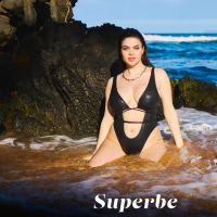 Busty hot chick Lola Johnson strips off her bikini to show her curves