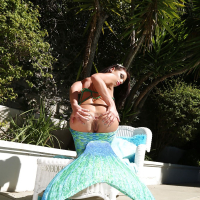 Amazing brunette babe Adriana Chechik playing with her asshole poolside