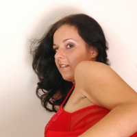 Sandy shows off her thick hairy pussy