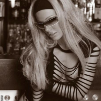 Sexy blonde Sandy is fingering in retro style