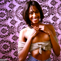 Smiley ebony floosie with pigtail uncovering her tiny titties