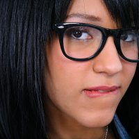 Young babe in glasses Tess Morgan exposing her hairy twat
