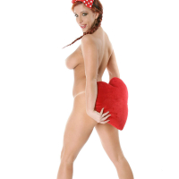Naughty redhead Ashley Robbins with big boobs