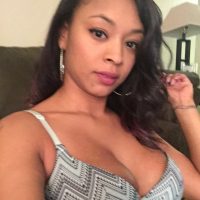 Sexy Porsha Carrera making out with a friend on the couch
