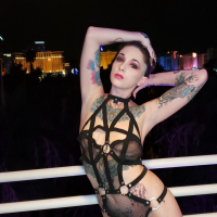 Tattooed hottie Sully Savage sucks off a big cock