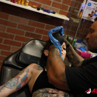 Kinky chick Sully Savage exposes her tattooed cunt