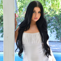 Holly Day with long hair sucks and rides a dildo in the bathroom