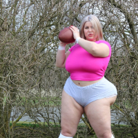 Sexy BBW chick Natasha Crown gets in some NFL football practice