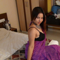Lovely Indian babe Tina showing her nice body in a sexy outfit