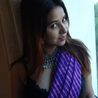 Lovely Indian babe Tina showing her nice body in a sexy outfit