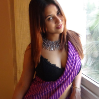 Lovely Indian babe Tina showing her nice body in a sexy outfit