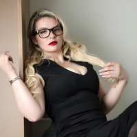 Smoking hot Emmy Demure posing in her sexy lingerie