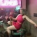 Curvy Emmy Demure posing in a pink bikini on the boat