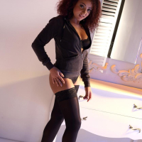 Kayla Louise teasing in black Stockings and Bra