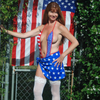 Dee Delmar showing off her big American Boobs
