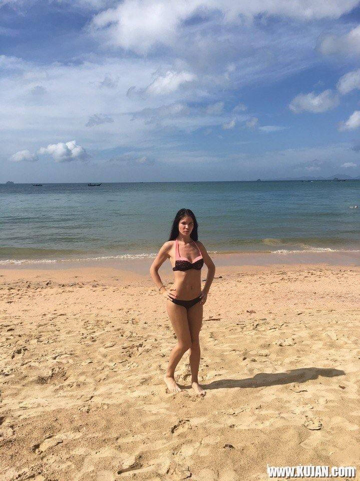 Gorgeous girl Lovenia Lux posing in a black bikini on the beach - Photo #3174842