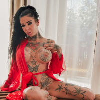 Tattooed Eden Ivy moans during nice fingering with Megan inky