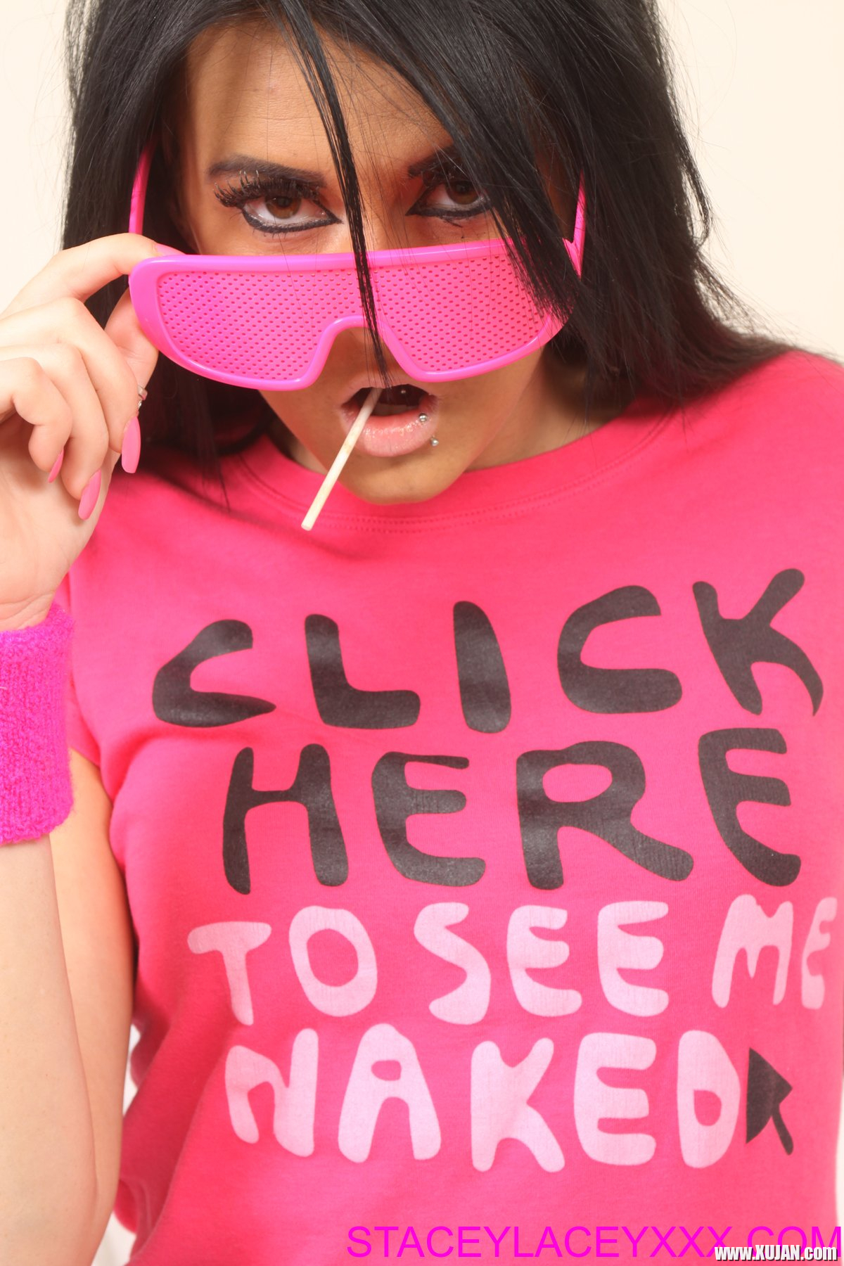 Stacey Lacey licks a Lollipop while stripping down - Photo #3176237