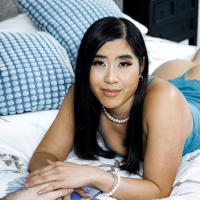 Small tits Asian Emerald Loves gives a blowjob and rides his stiff dick
