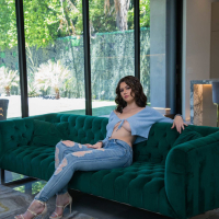 Brunette Ellie Nova having fun while giving Lawson Jones a nice titjob