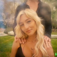 Busty beauty Kathryn Mae has fun sucking and getting banged on bed