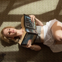 Blonde babe Catie Parker flashes in public Library