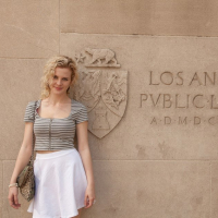 Blonde babe Catie Parker flashes in public Library