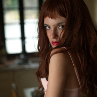 Sexy redhead starlet Catarina Foxy exposes her hot body lines