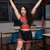Cheerleaders Coco Lovelock and Pixie Smalls have sex on the table
