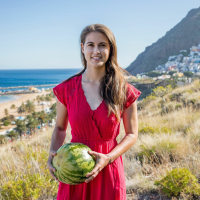 Pretty young Nina Sphinx indulges sweet watermelon and spreads tight pussy