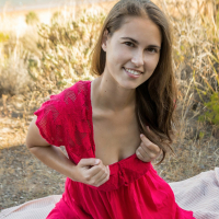 Pretty young Nina Sphinx indulges sweet watermelon and spreads tight pussy