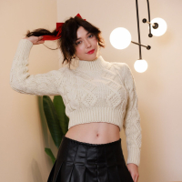 Provocative solo model Mila Azul removes her leather skirt and panties