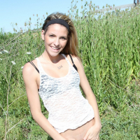 Cute Shiny Lola drops down her Pantyhose Outdoors