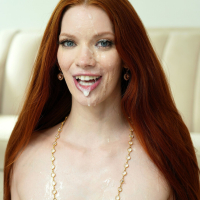 Redhead Erin Everheart moans during rough double penetration