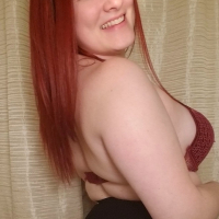 Jessica Sage wears Black Stockings showing Boobs