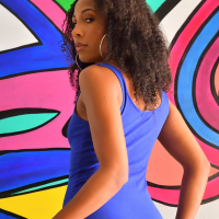 Ebony Olivia Jayy lifts up her tight blue dress