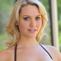 Blonde Mia Malkova wearing black high heels flashing her puss