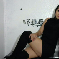 Hot Latina babe Sofia Gomez poses in black boots with kitty ears