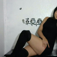 Hot Latina babe Sofia Gomez poses in black boots with kitty ears