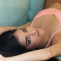 Lustful brunette girl Emily Willis drops down her sexy pink lingerie