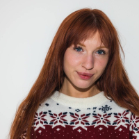 Redhead model Lilly Mays drops her panties and spreads pussy lips